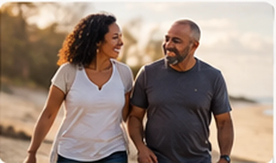Two adults walking together and supporting one another.