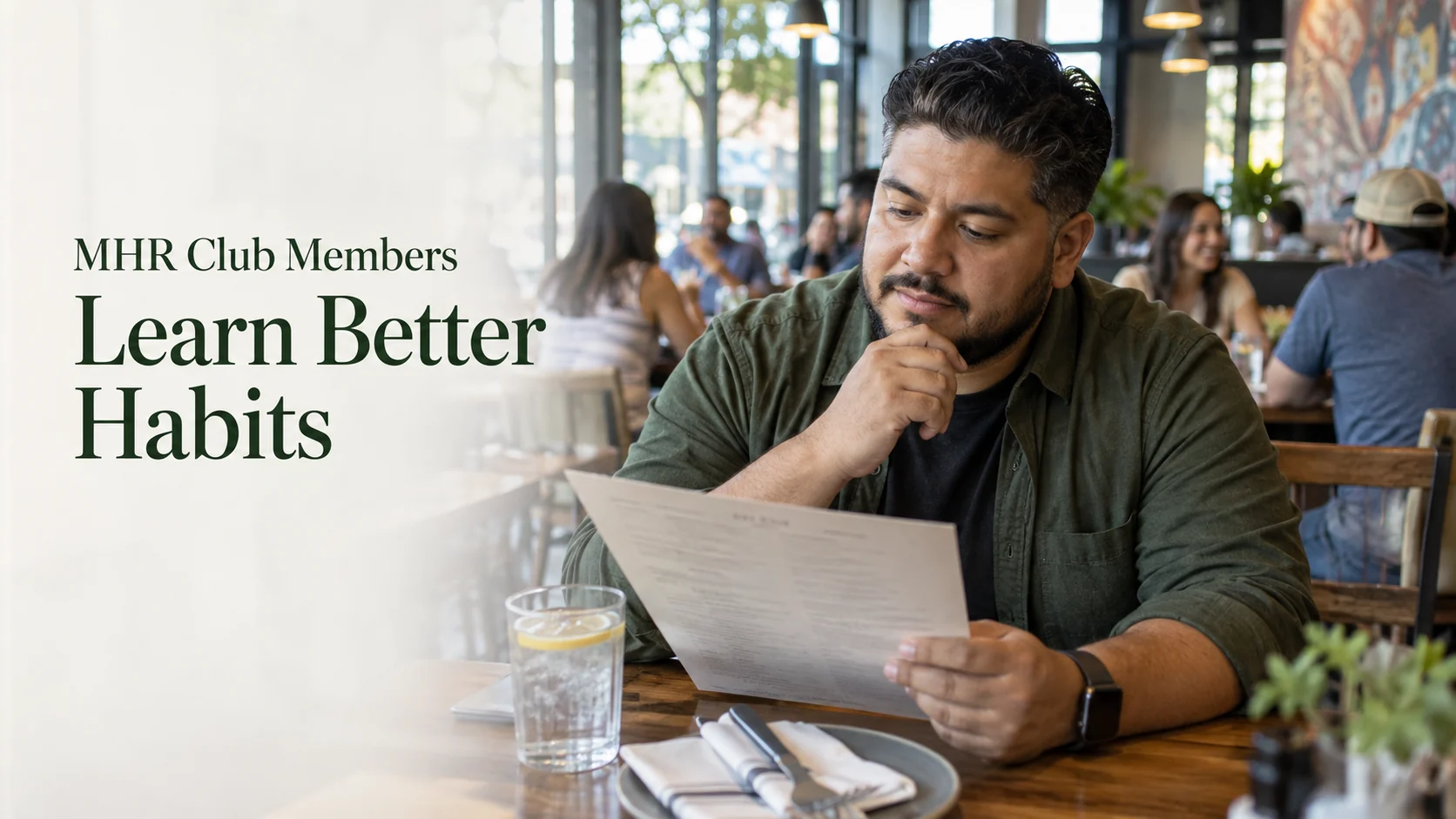 MHR Club member reviewing a restaurant menu.